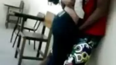 Young India College girl kissing in classroom