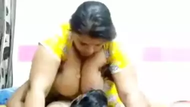 Guy lies on the bed and worships Desi wife's sexy huge XXX hooters